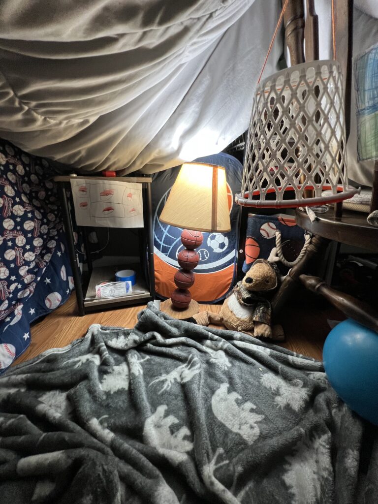 a pillow and blanket fort